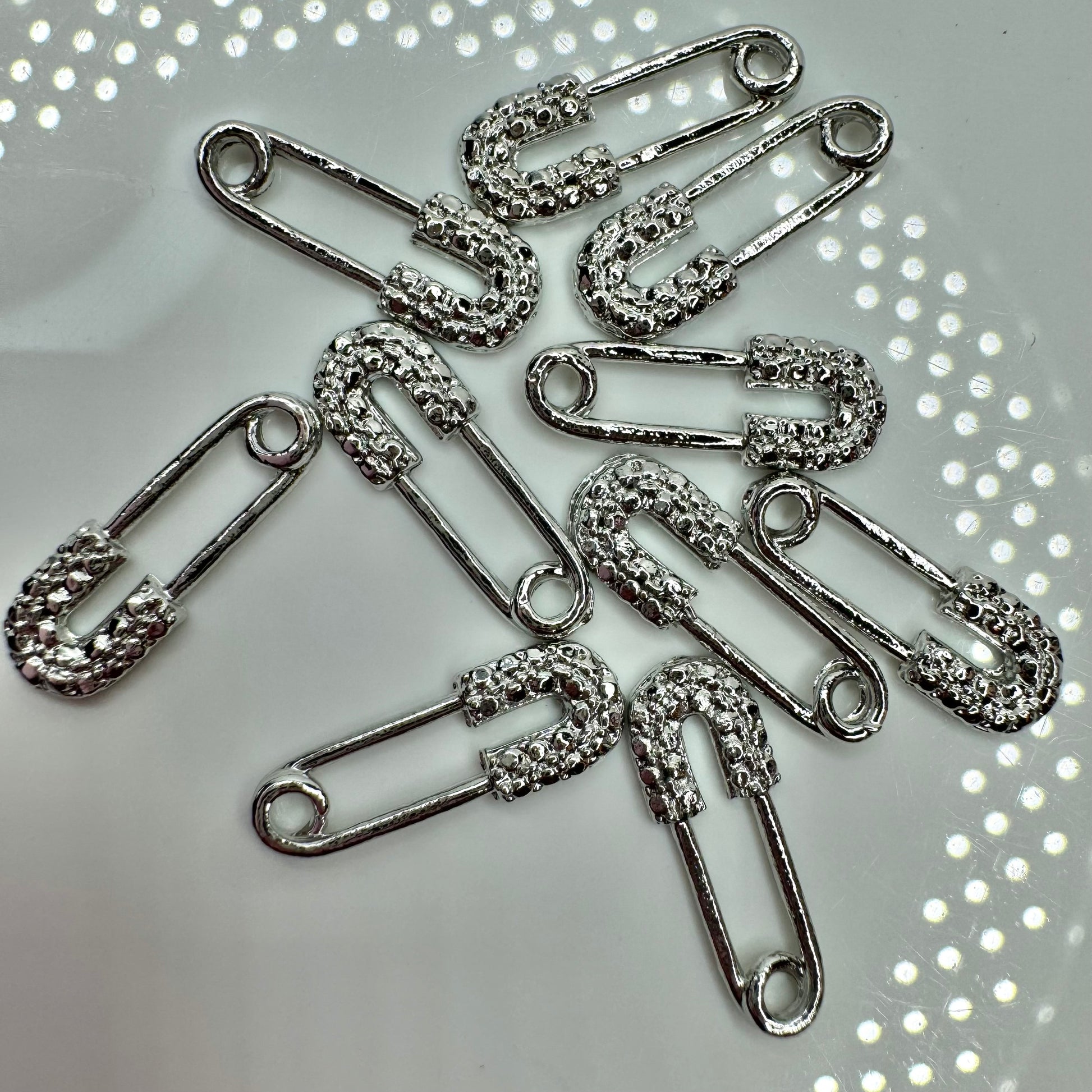 Safety pin charms