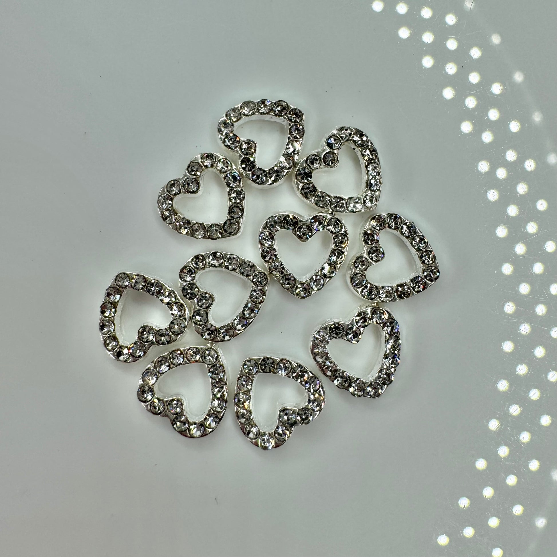 Silver heart charms